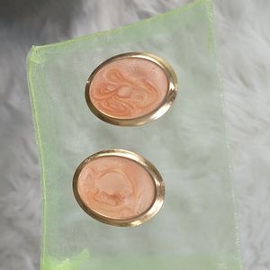 Vintage mid-century modern oval gold orange peach cream earrings
